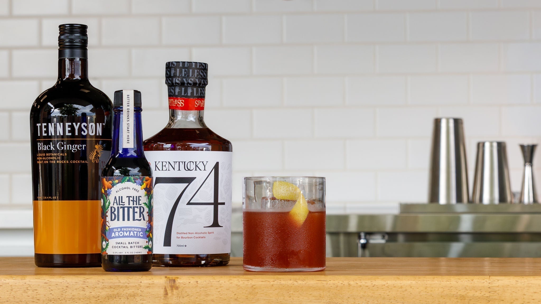 Photo of a non-alcoholic Old Fashioned mocktail made with Kentucky 74, Tenneyson, and All The Bitter.