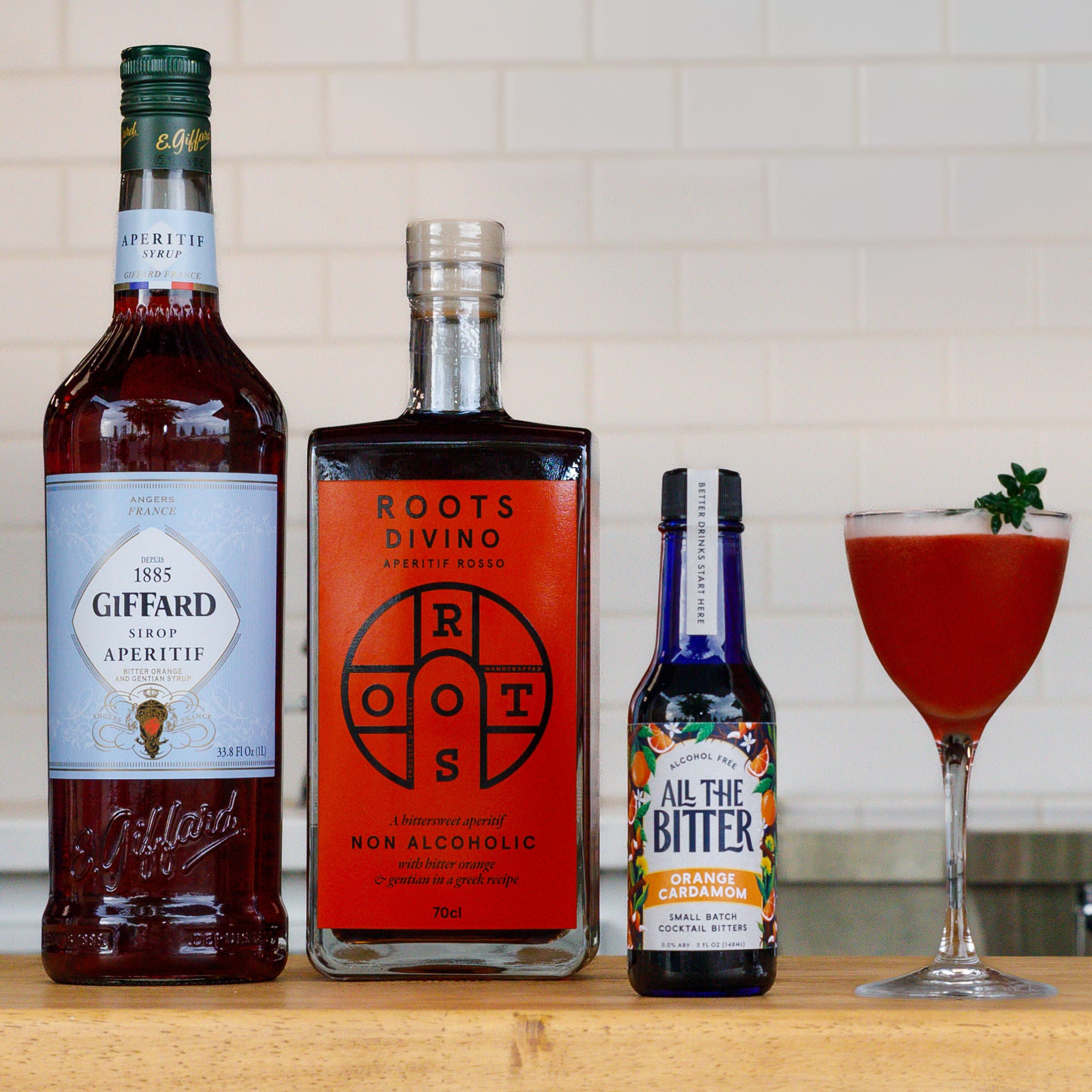 Non-alcoholic Campari sour made with Giffard, Roots vermouth, and All The Bitter.