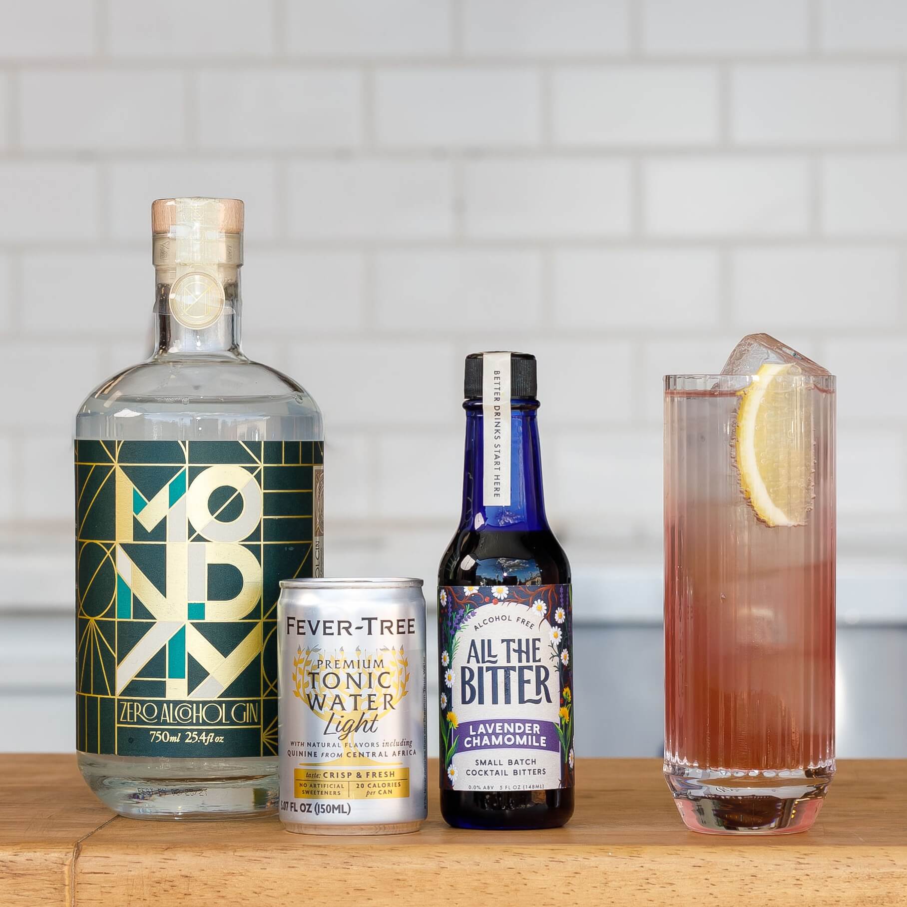Non alcoholic lavender gin and tonic made with lavender bitters and Monday zero proof gin alternative